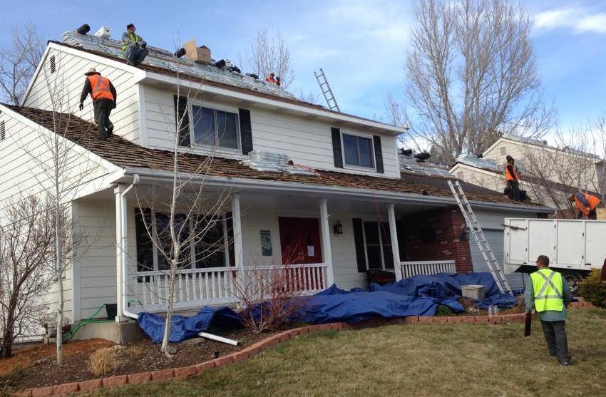 Roof cleaned of moss and algae by ARCM Roofing in Denver
