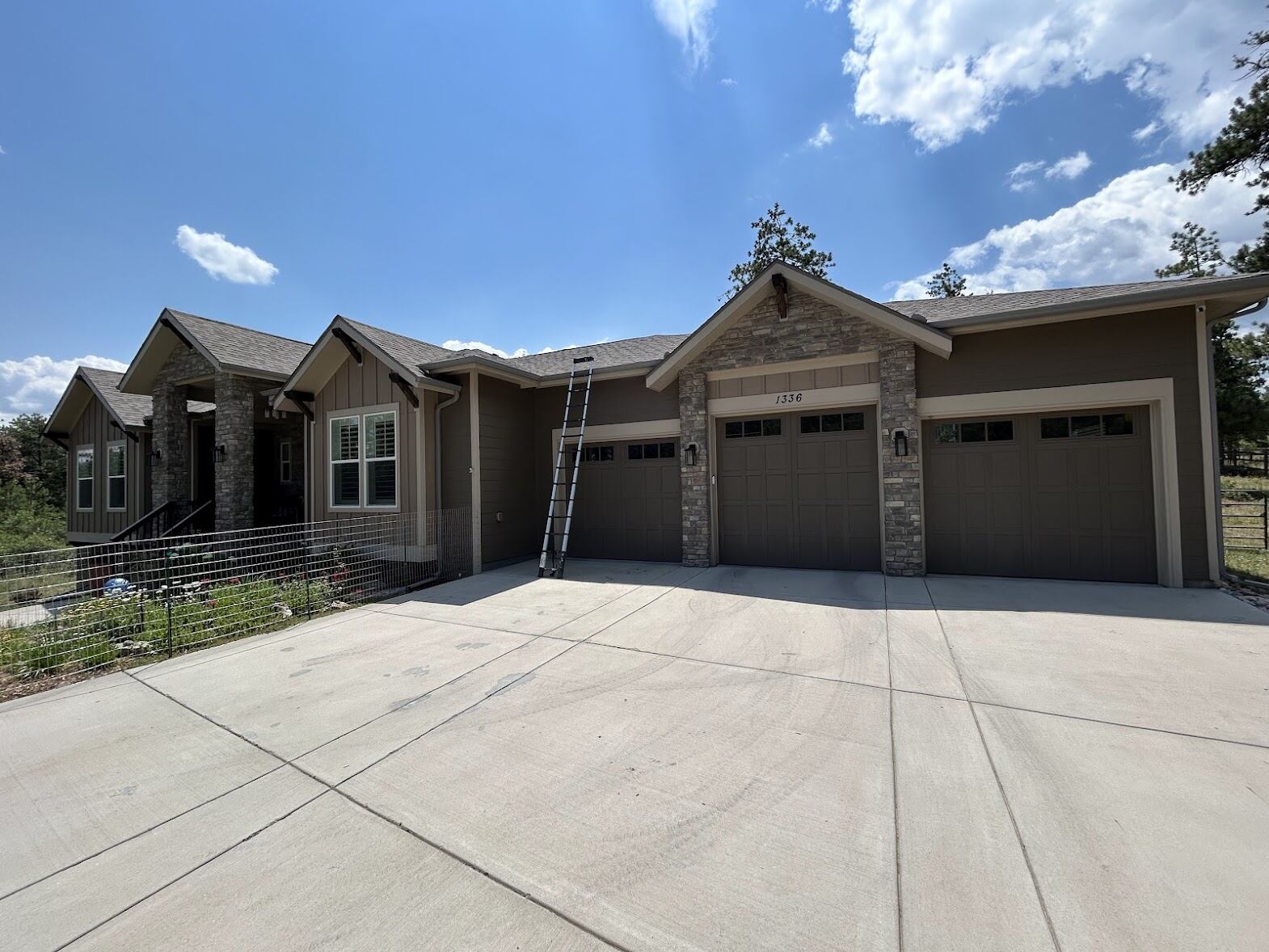Two-story home in Boulder, Colorado with a new architectural shingle roof installed by ARCM Roofing