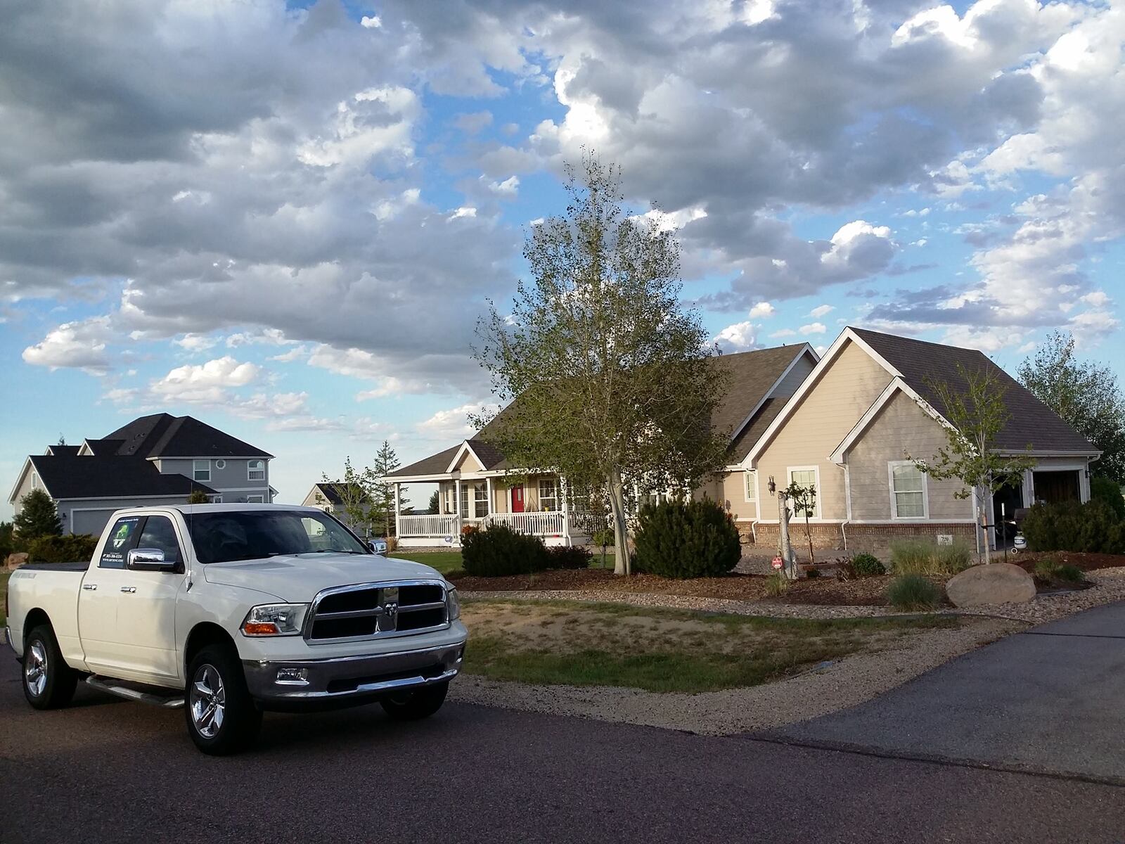 Aerial drone view of a completed asphalt shingle roof replacement in Broomfield, Colorado by ARCM Roofing