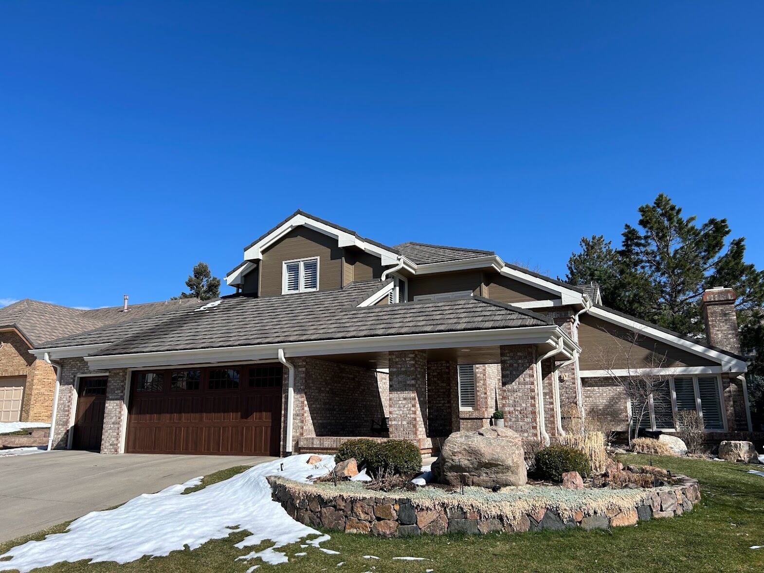 Home in Greenwood Village, Colorado with a newly installed shingle roof by ARCM Roofing