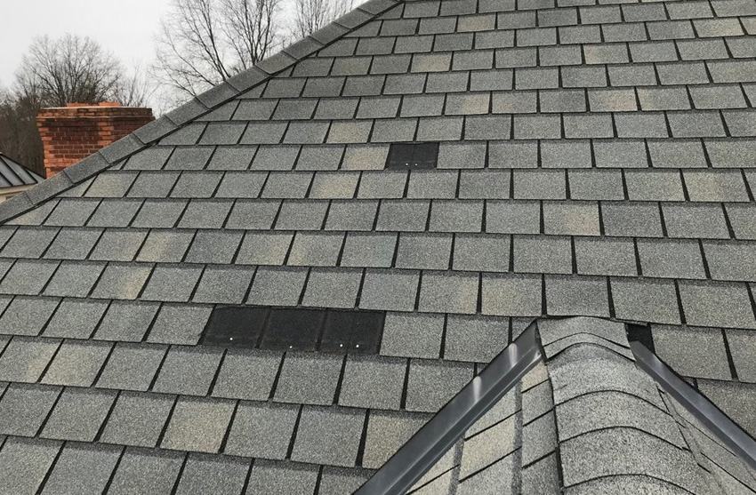 Storm-damaged Denver roof under restoration by ARCM Roofing